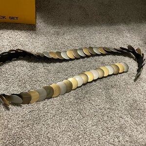 Vintage mixed metal stretchy belt.